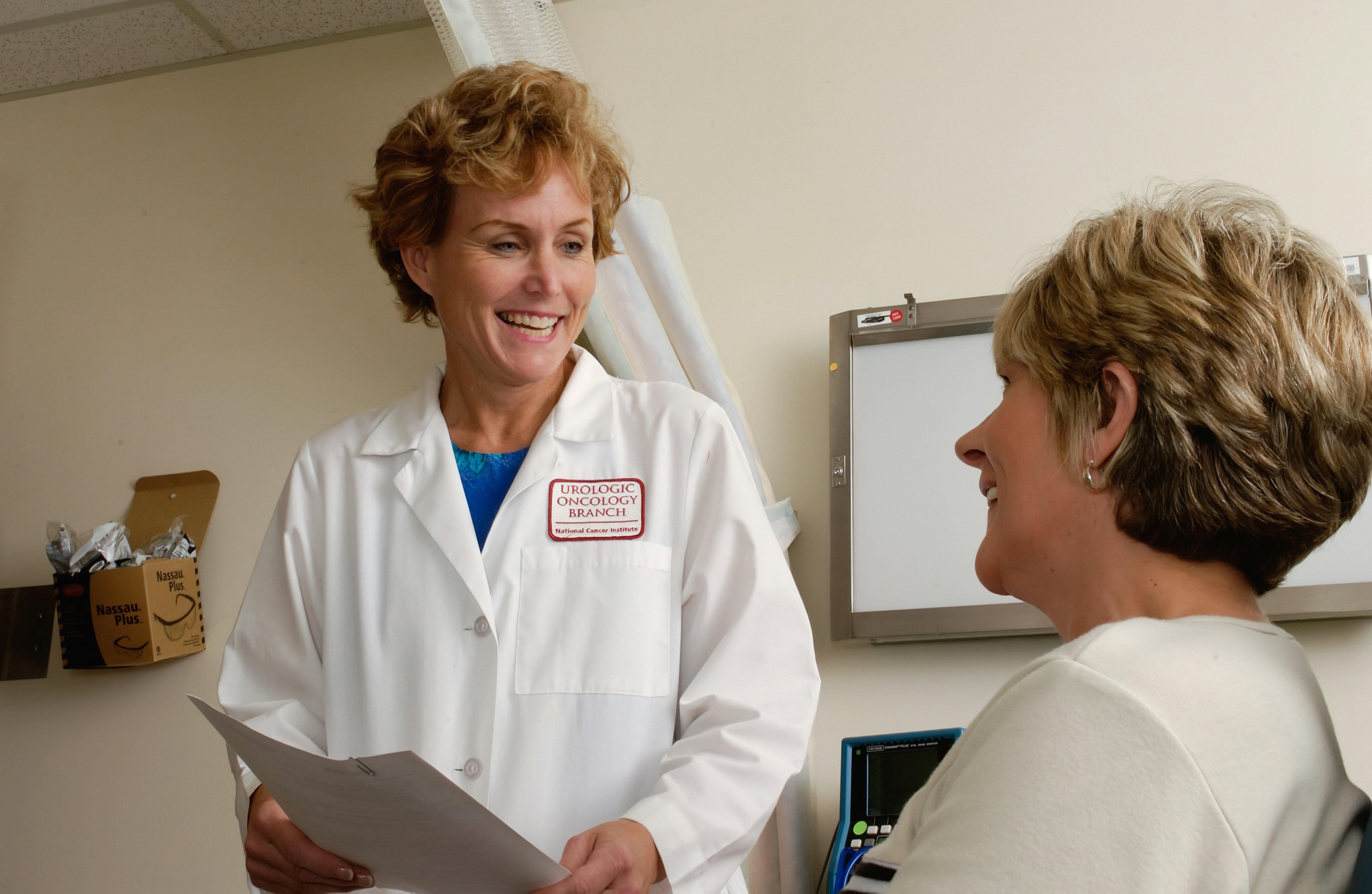 Doctor helping patient